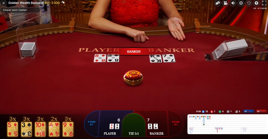 Croupière en direct a la table Golden Wealth Baccarat d'Evolution