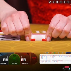 Croupière a la table Baccara Squeeze sur Magical Spin